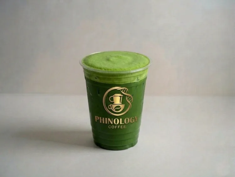 Matcha whisk, bowl, and a matcha latte