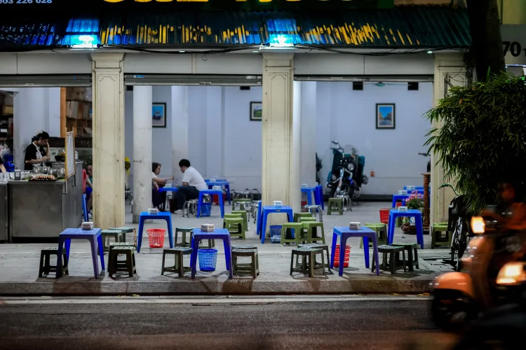 Person enjoying Vietnamese coffee slowly